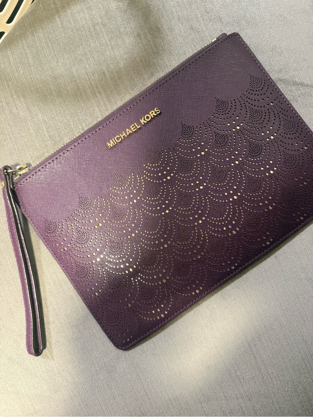 Michael Kors Plum Laser-Cut Wristlet Clutch with Gold Accents